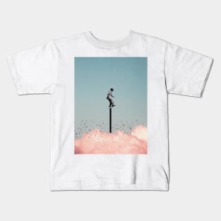 Balancing on one leg above the clouds Kids T-Shirt